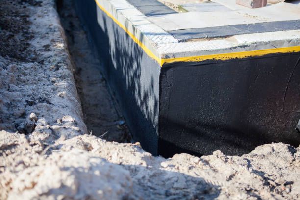Professional Waterproofing technician working in Rushville, IN